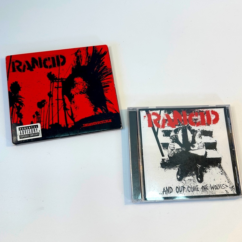 Rancid Set‎ of 2 CDs - Indestructible & … And Out Come The Wolves